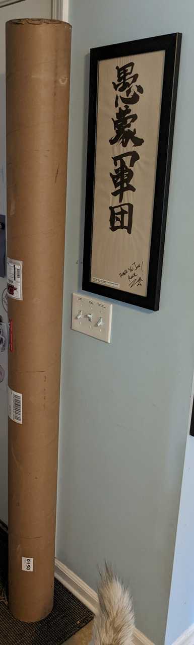 The arrival of the aluminum; huge container. Next to some original Angelspit art!