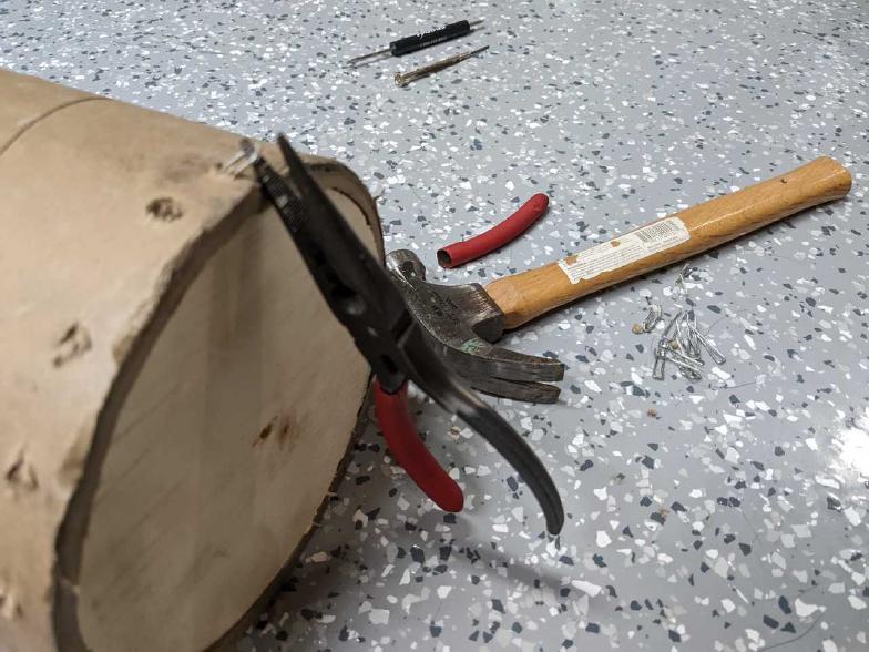 Removing the huge staples.