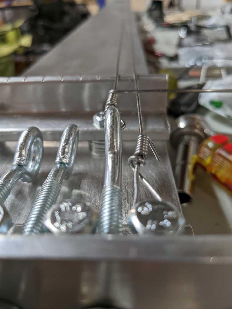 Starting stringing with the eyelets.