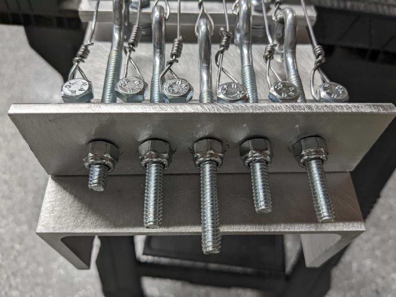 Switched to using vinyl locknuts instead of double nuts.