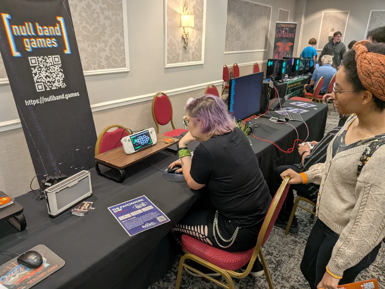 An expo attendee playtesting The Patchwork Ship